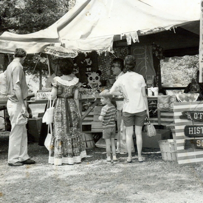 The O'Fallon Historical Society at the centennial celebrations. That sign can now be found on the Log Cabin Museum in Civic Park.