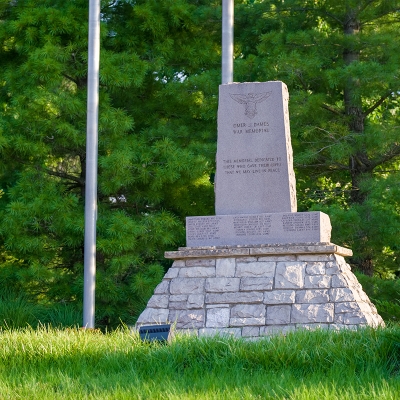 The Omer J. Dames War Memorial surrounded by natural Dames Park.