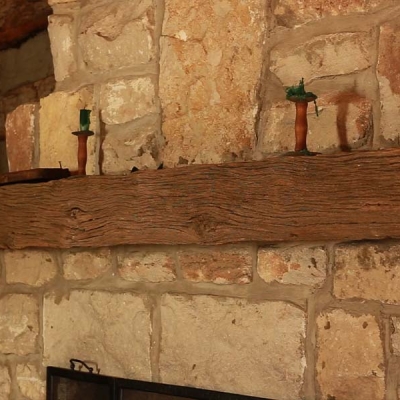 The wooden mantlepiece is made from one of the last surviving logs of Jacob Zumwalt's original log cabin