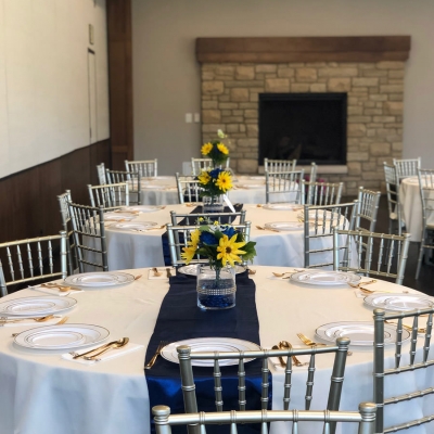 Tables are decorated for a reception at O'Day Lodge