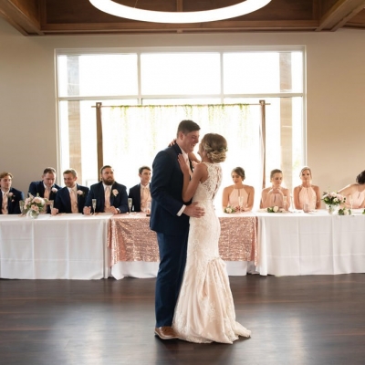 Bride and groom embrace for the first dance