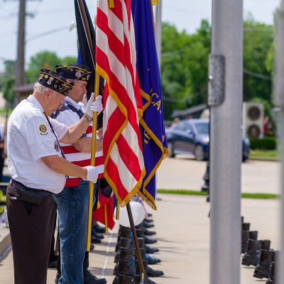 During a ceremony, veterans post the colors.