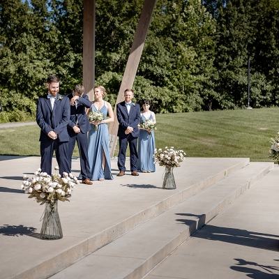 The couple to be married stands at the alter at O'Day Park Amphitheater.