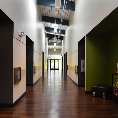 High ceilings in the hallways that connects the rooms to the restrooms and other parts of the venue.