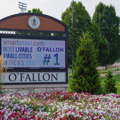 Entrance sign and landscaping at CarShield Field