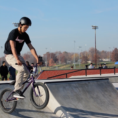 BMX biker does tricks at Westhoff Plaza